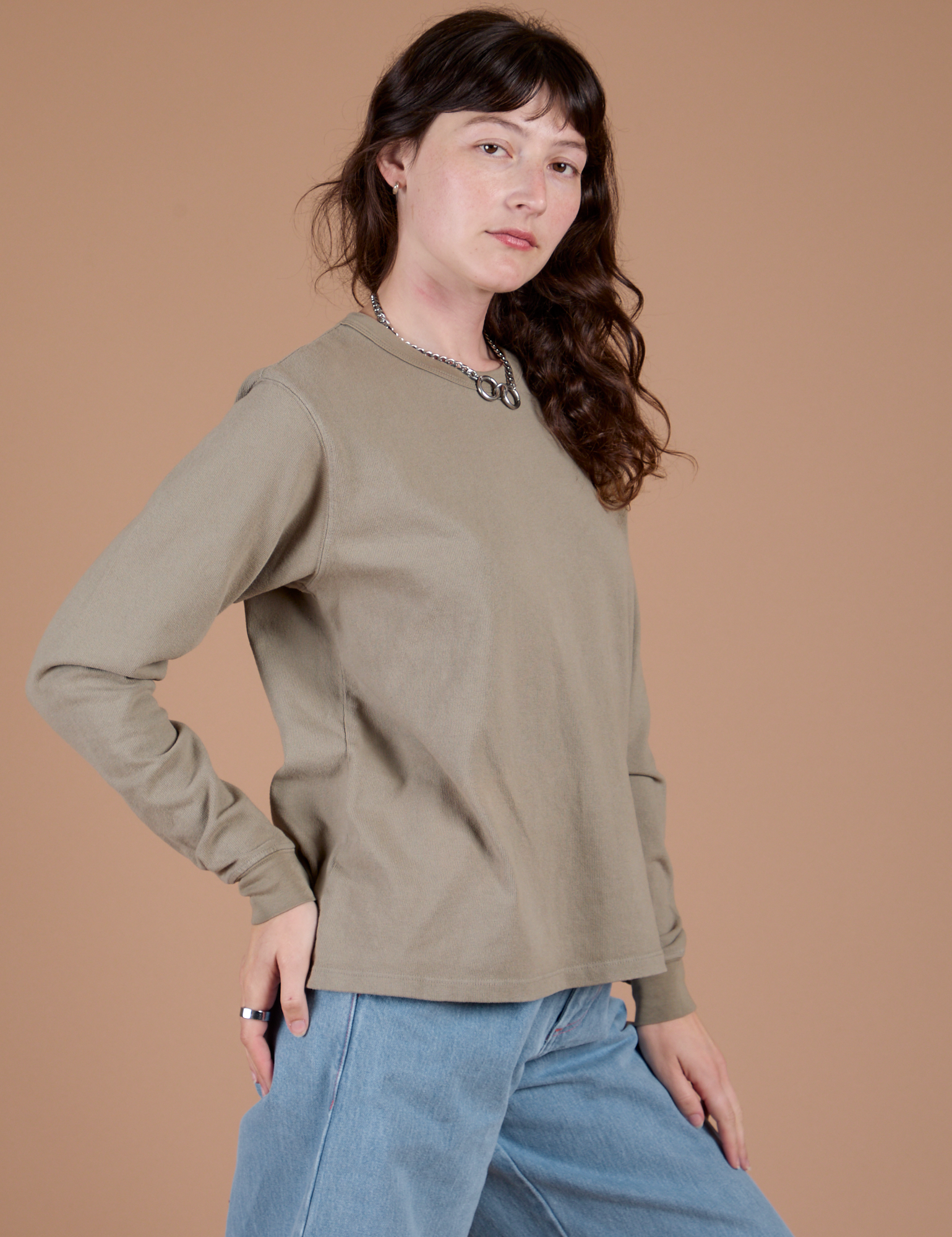 Long Sleeve Burly Tee in Khaki Grey side view on Alex