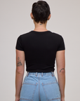 Back view of Baby Tee in Basic Black on Alex