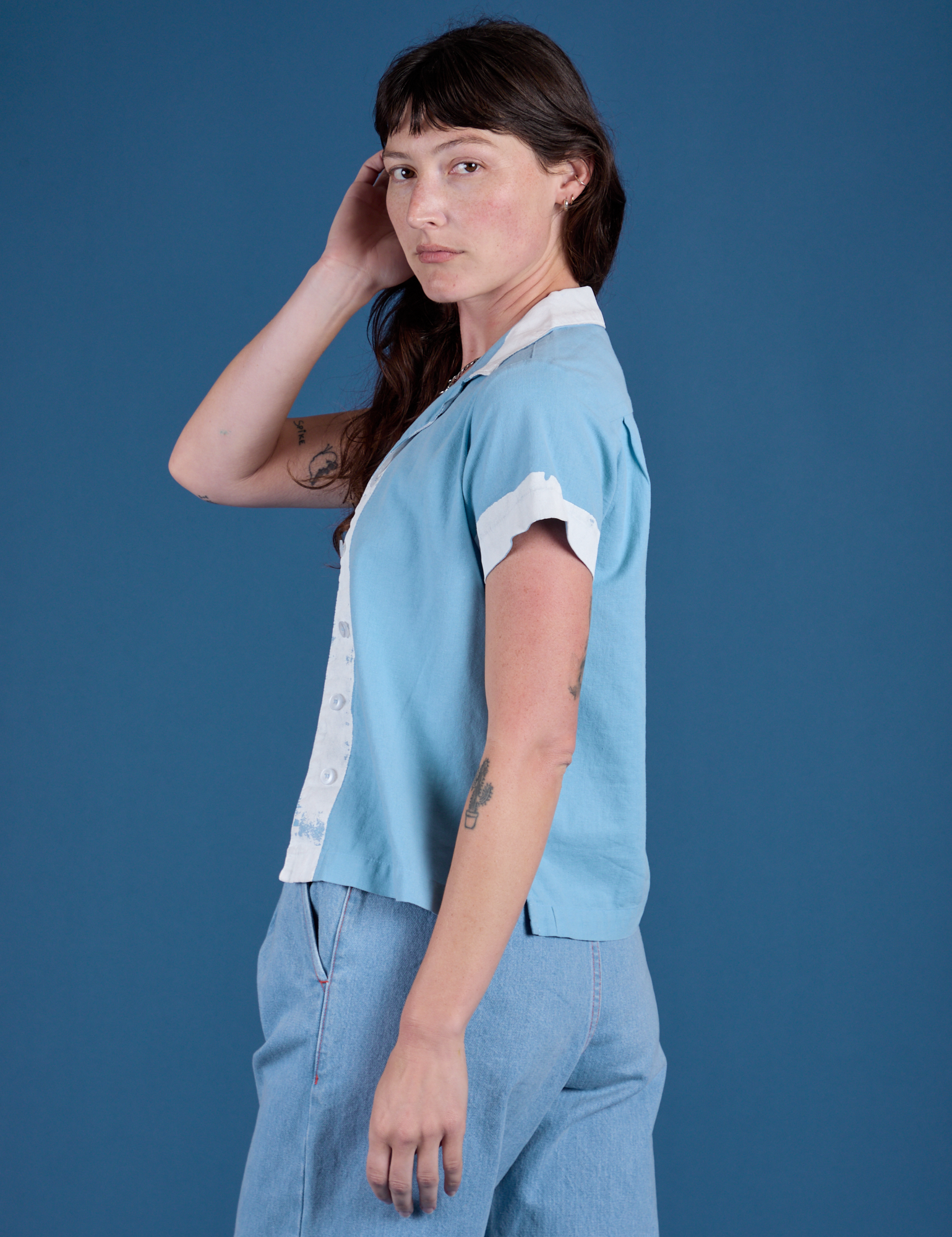 Painted Pantry Button-Up in Baby Blue side view on Alex