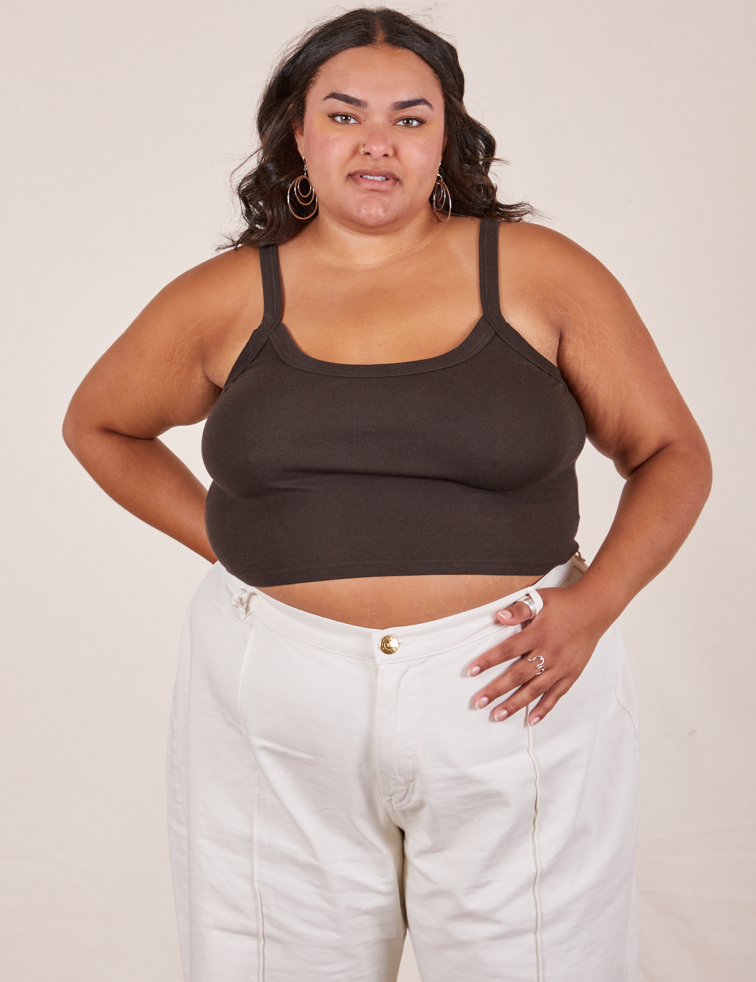 Alicia is 5'9" and wearing XL Cropped Cami in Espresso Brown paired with vintage tee off-white Western Pants