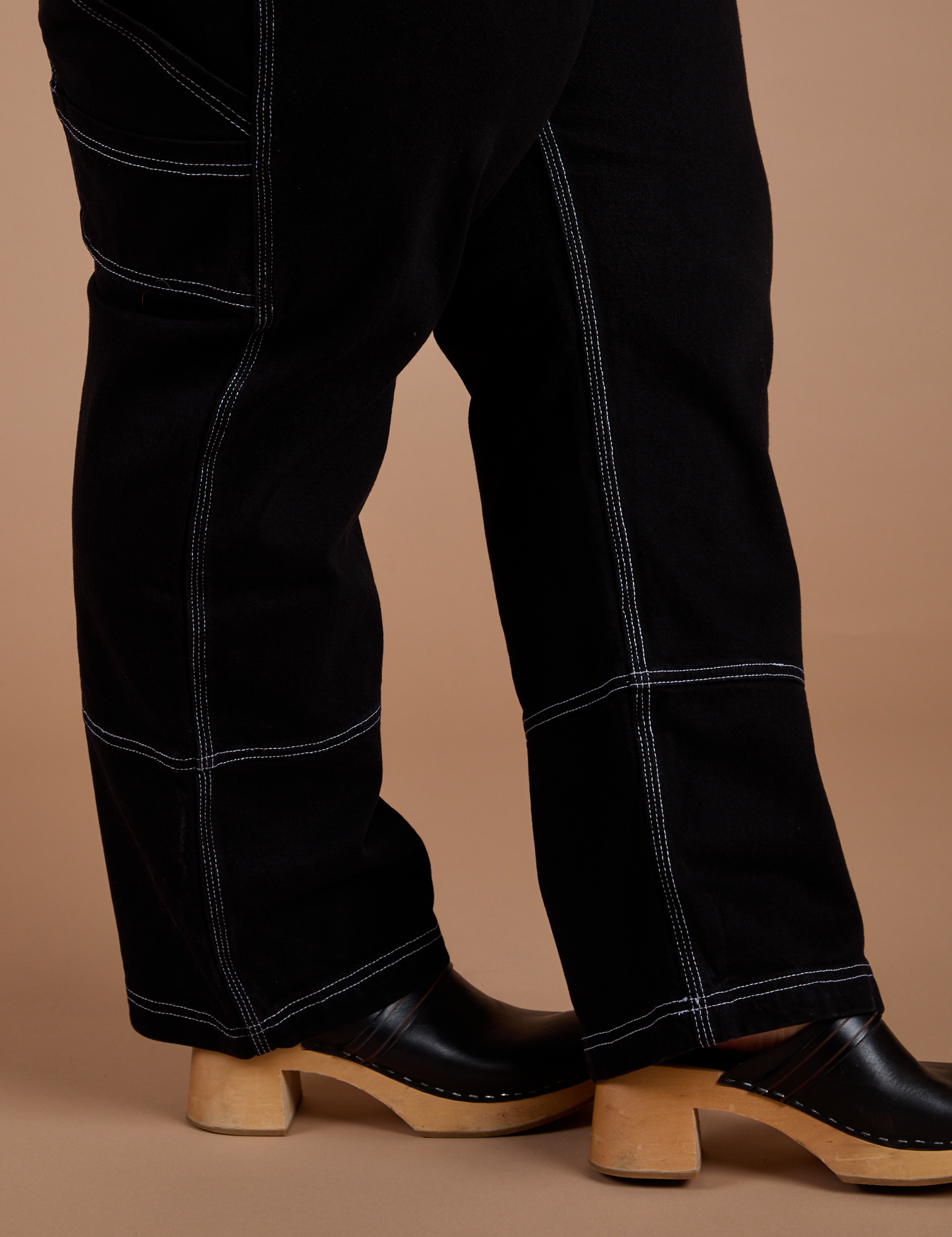 Carpenter Jeans in Black side pant leg close up on Ashley