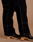 Carpenter Jeans in Black side pant leg close up on Ashley