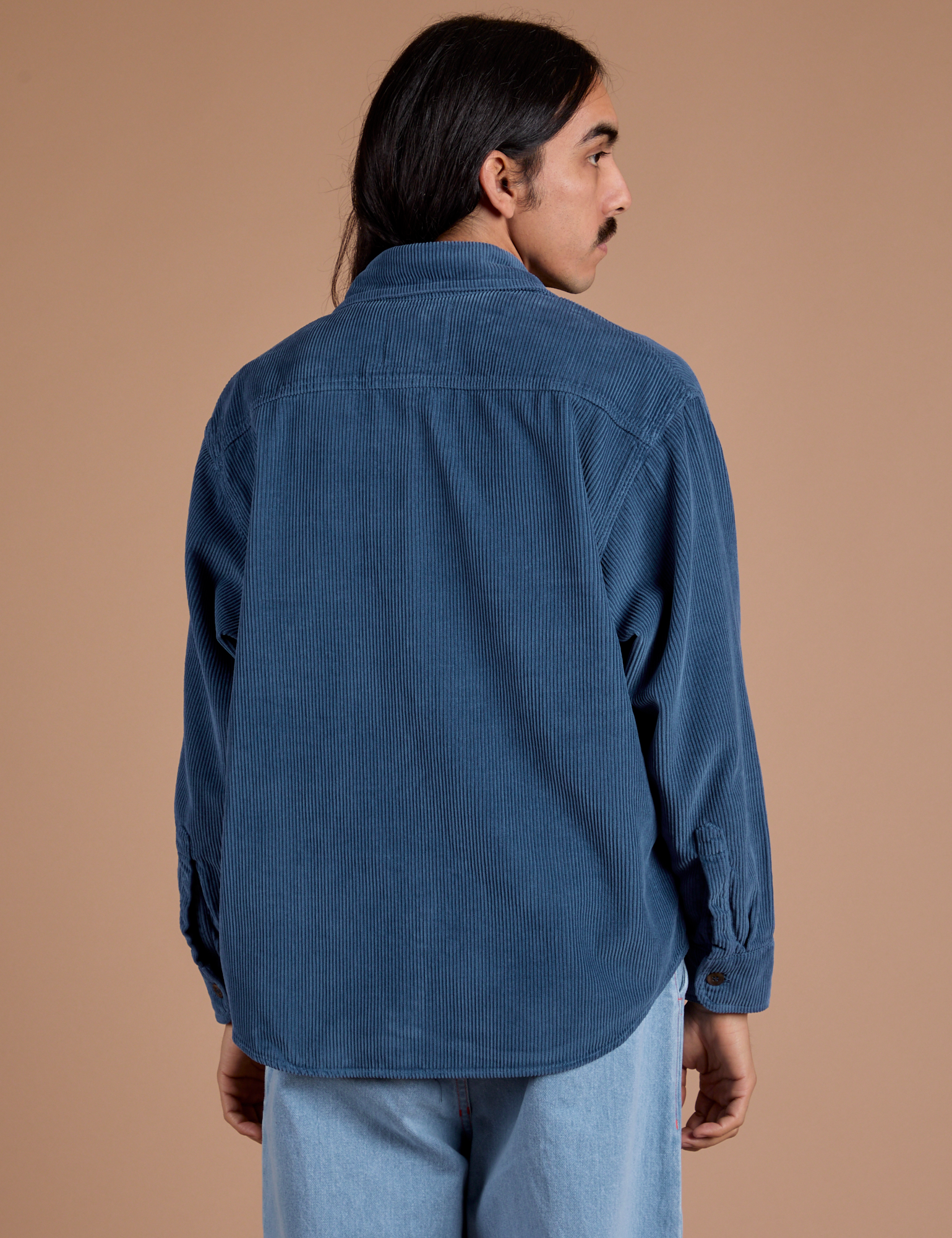 Back view of Cropped Corduroy Overshirt in French Blue on Anthony