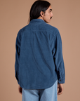 Back view of Cropped Corduroy Overshirt in French Blue on Anthony