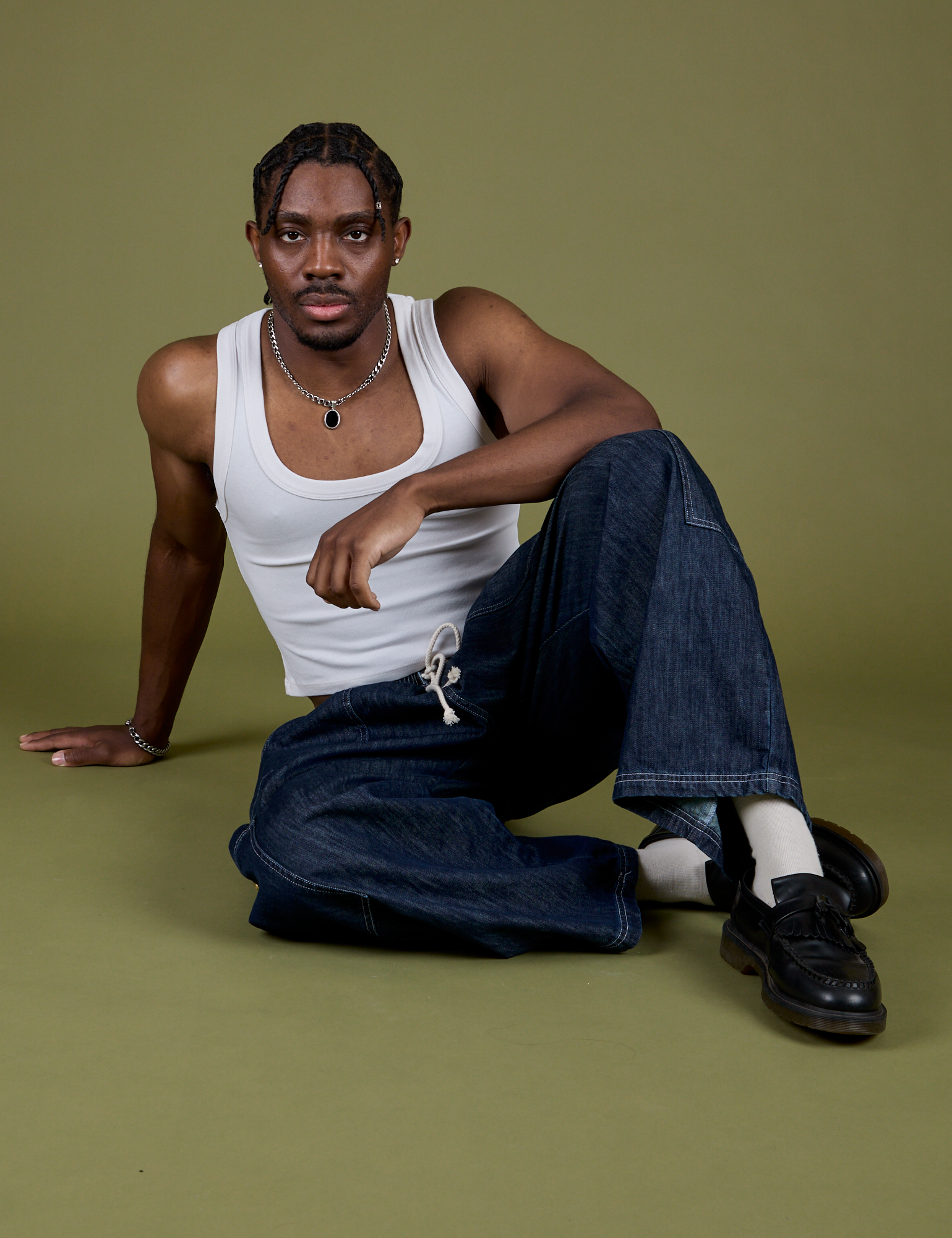 Denim Drop Pocket Pants in Dark Wash and Cropped Tank in Vintage Tee White worn by Isaac