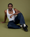 Denim Drop Pocket Pants in Dark Wash and Cropped Tank in Vintage Tee White worn by Isaac