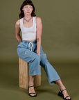Denim Drop Pocket Pants in Light Wash and Cropped Tank in Vintage Tee White on Alex