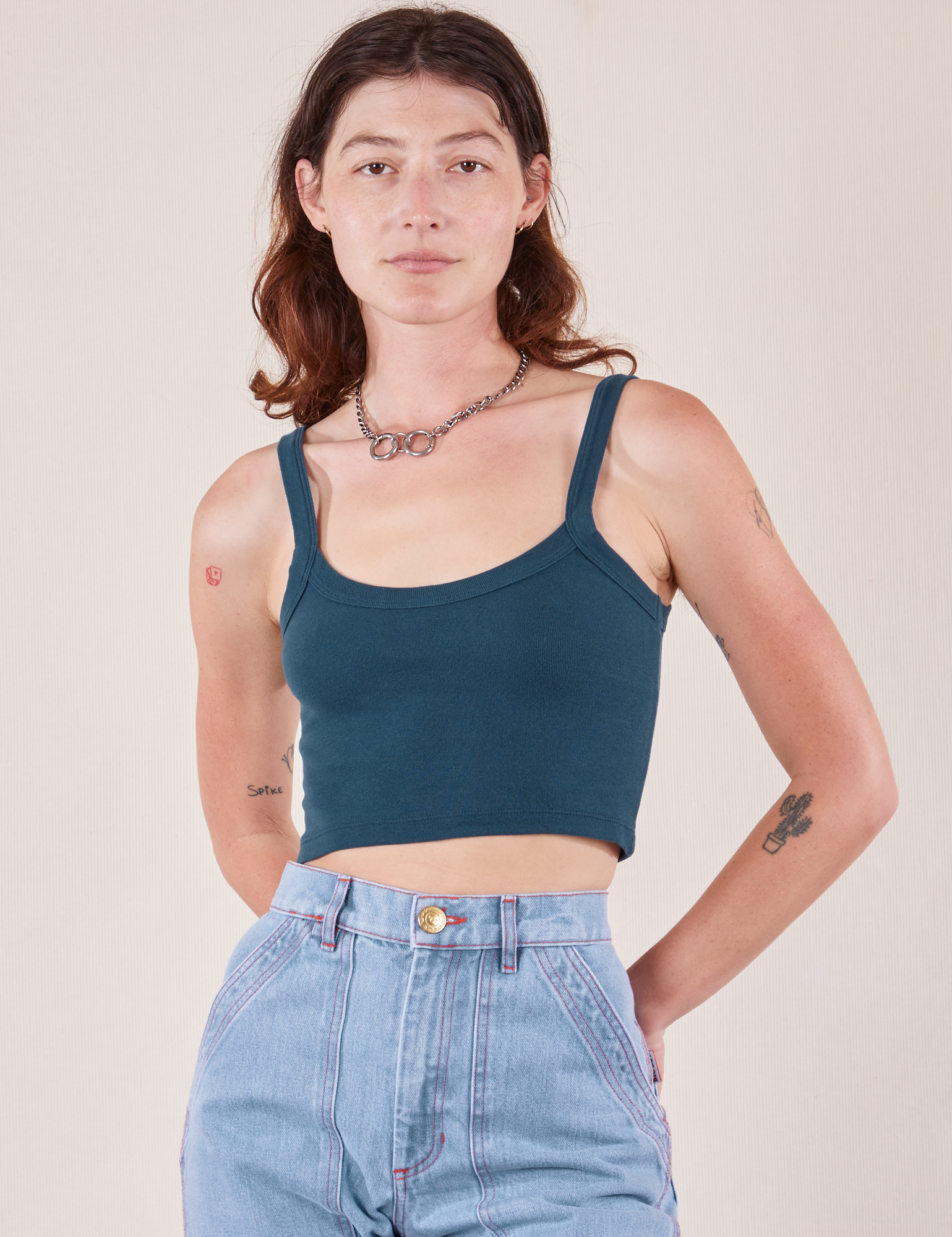 Alex is 5'8" and wearing P Cropped Cami in Lagoon