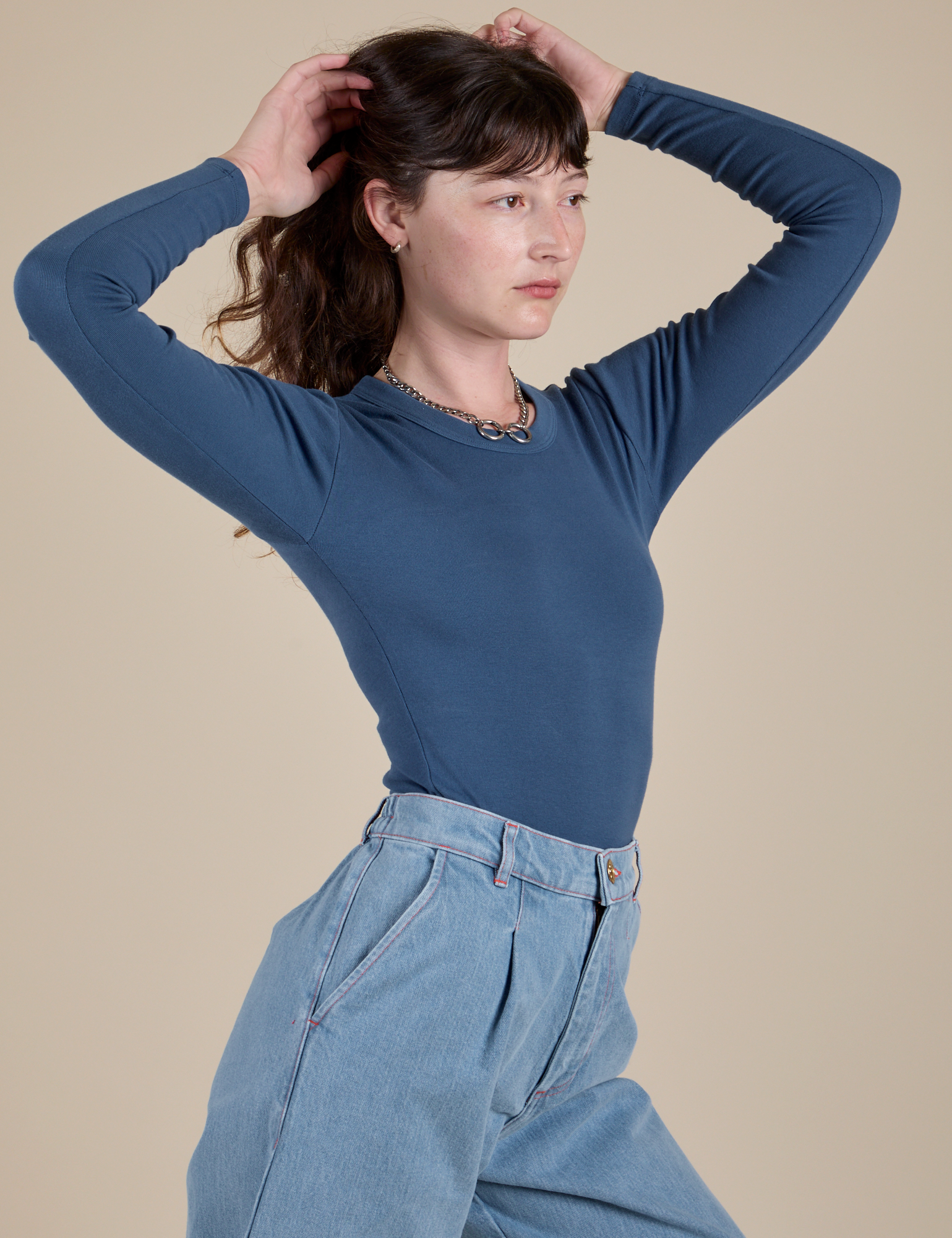 Long Sleeve Baby Tee in French Blue side view on Alex