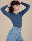 Long Sleeve Baby Tee in French Blue side view on Alex
