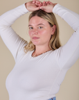 Long Sleeve Baby Tee in Vintage Tee Off-White angled front view on Lish