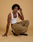 Baggy Mid-Rise Trousers in Desert Brown and vintage tee white Cropped Tank on Jerrod
