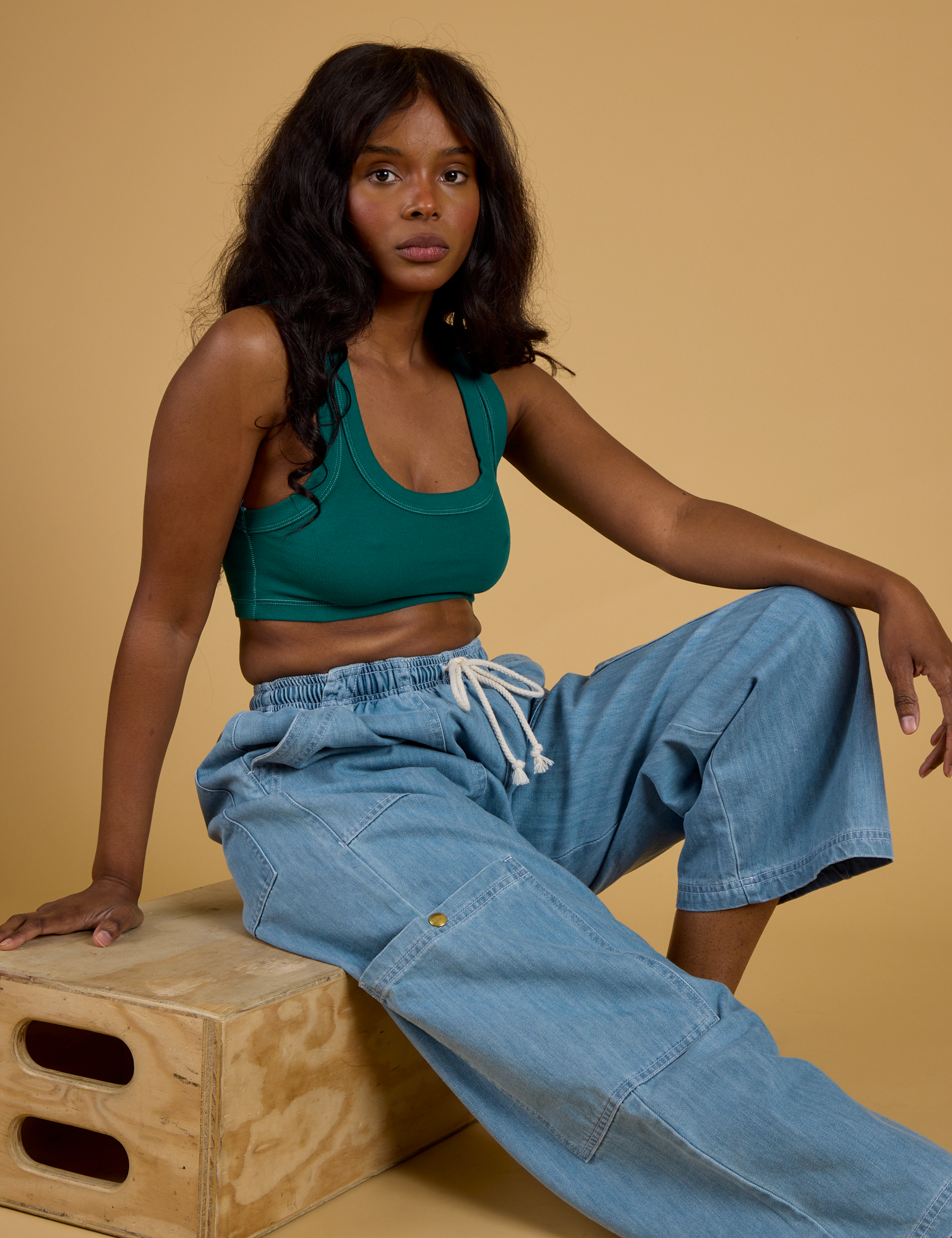 Contrast Stitch Mini Tank in Hunter Green and light wash Denim Drop Pocket Pants on Kandia