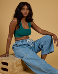 Contrast Stitch Mini Tank in Hunter Green and light wash Denim Drop Pocket Pants on Kandia
