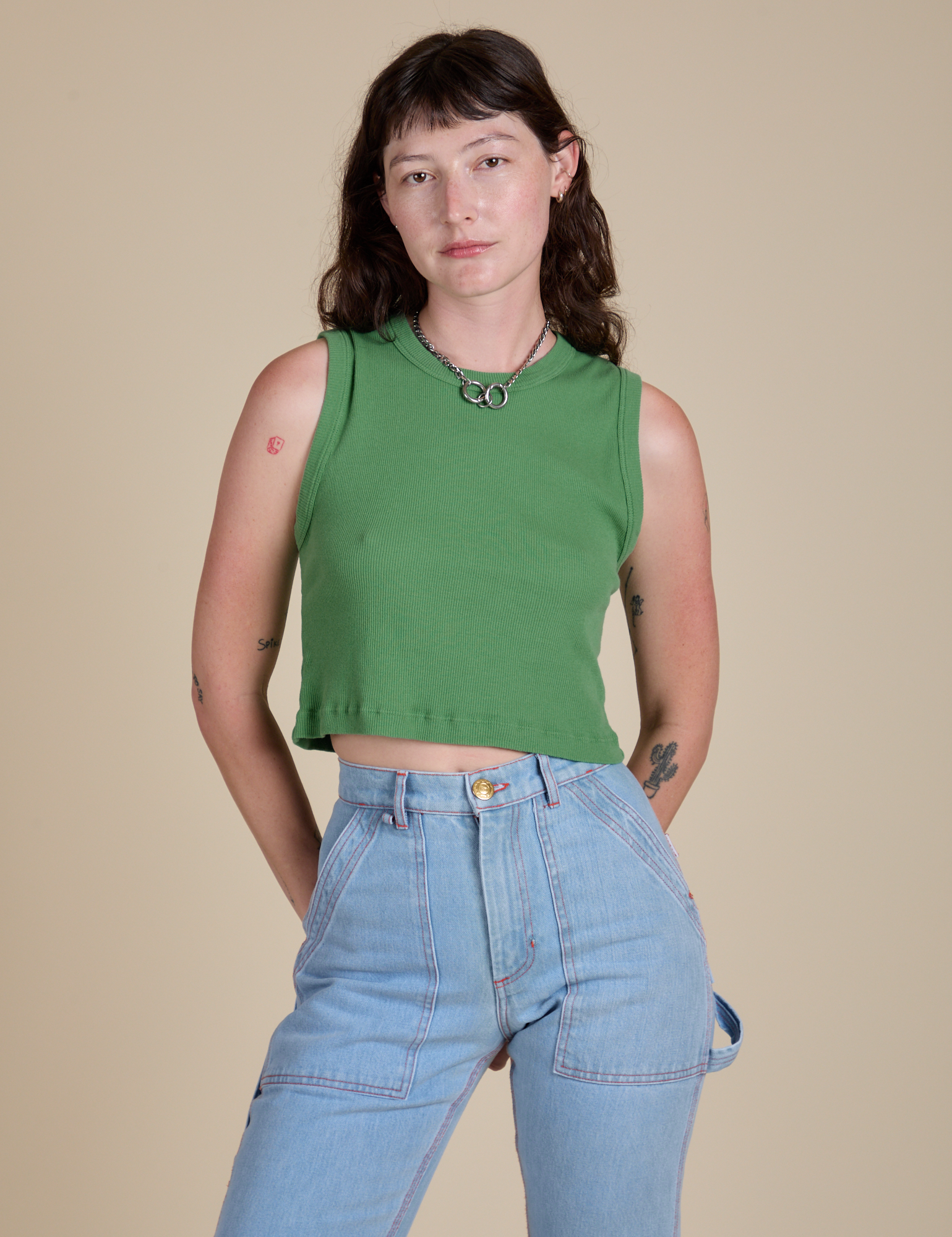 Alex is 5’8” and wearing XP Muscle Tee in Seafoam Green