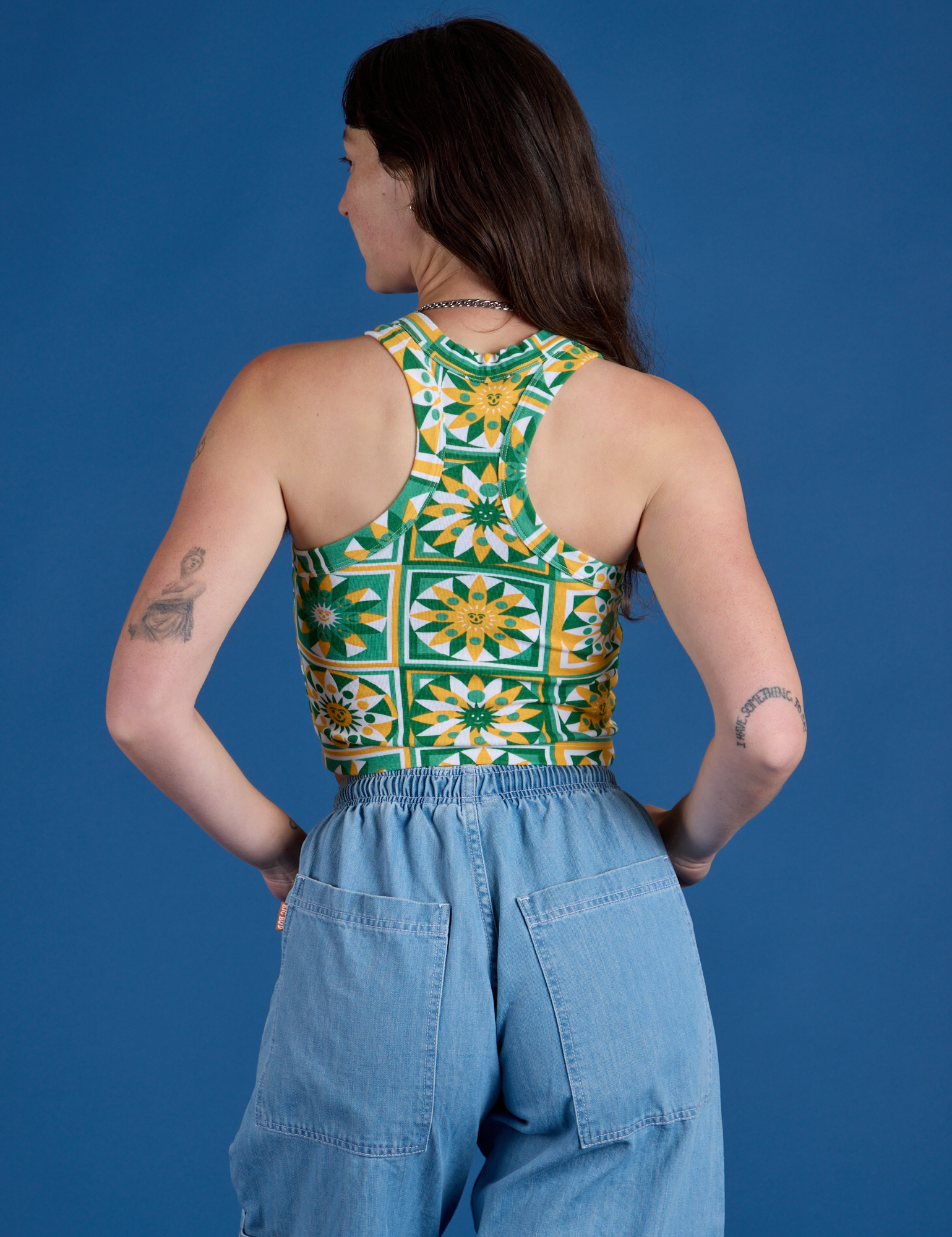 Deep-Cut Racerback Tank in Spring Quilt Print back view on Alex
