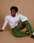 Railroad Denim Work Pants in Gross Green Overdye and vintage tee white long sleeve baby tee on Isaac