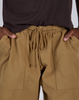 Drop Pocket Cargo Pants in Desert Brown front close up on Isaac
