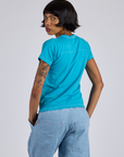 Jr. Varsity Tee in Hawaiian Blue back view on Kira