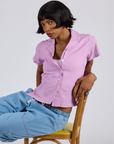 Kira is wearing Pantry Button-Up in Lilac Purple
