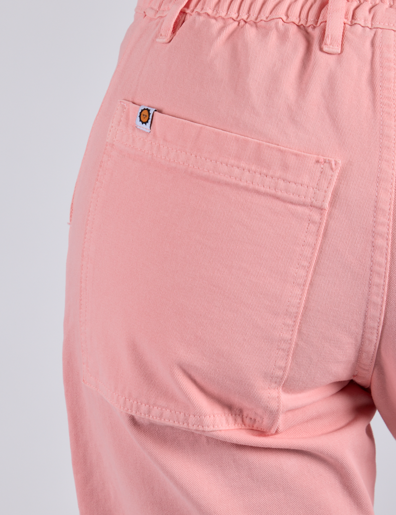 Work Pants in Baby Pink back pocket close up