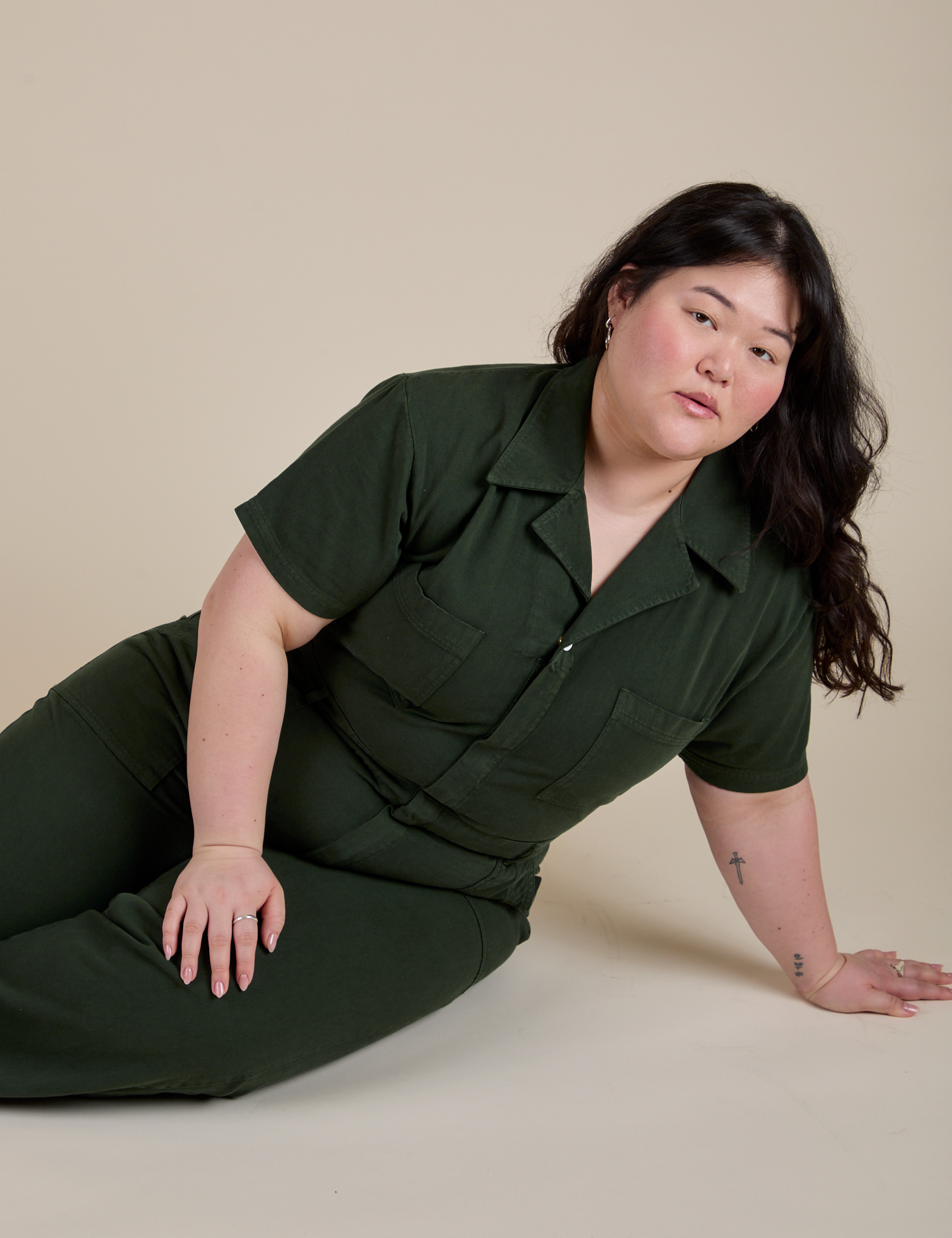 Short Sleeve Jumpsuit in Swamp Green worn by Ashley