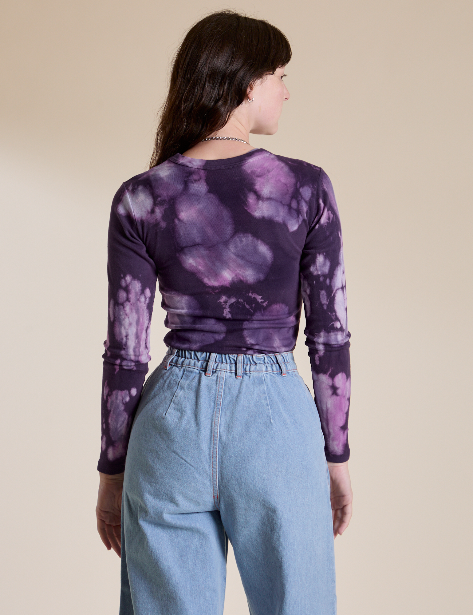 Long Sleeve Baby Tee in Dark Lavender back view on Alex