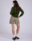 Back view of Pleated Trouser Shorts in Khaki Grey and evergreen Long Sleeve Burly Tee