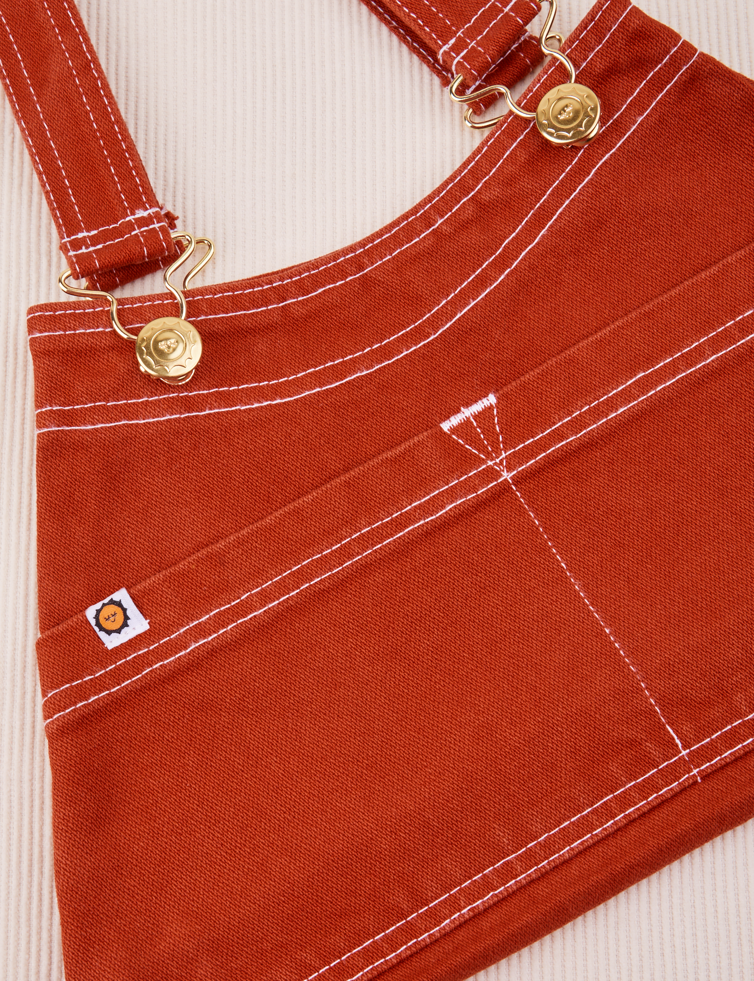 Overall Handbag in Paprika. White contrast stitching.