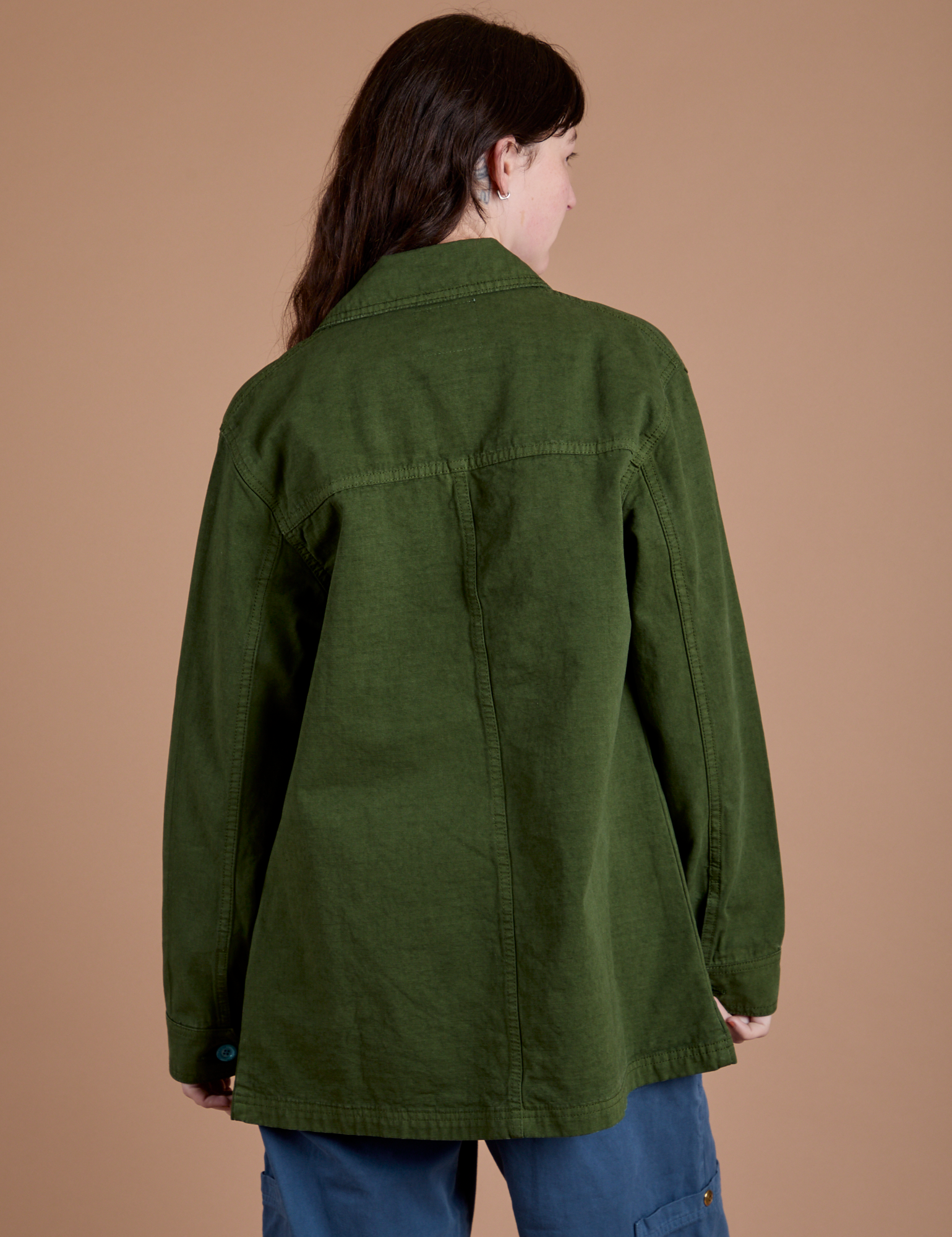 Back view of Ripstop Field Coat in Evergreen on Alex