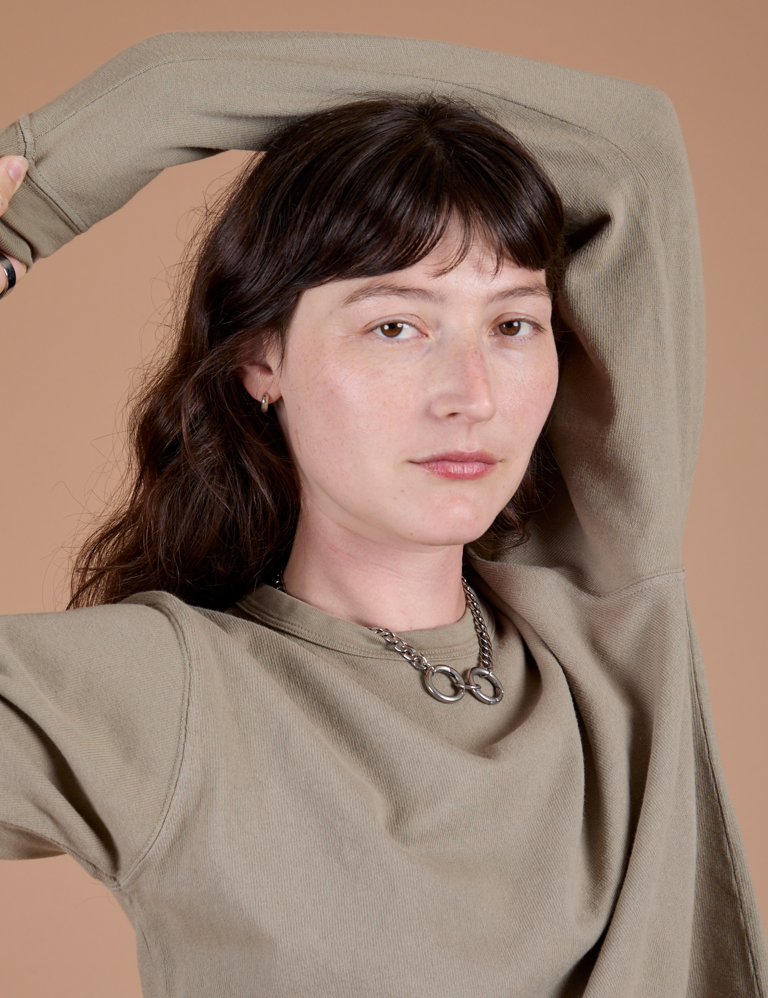 Close up of Long Sleeve Burly Tee in Khaki Grey on Alex