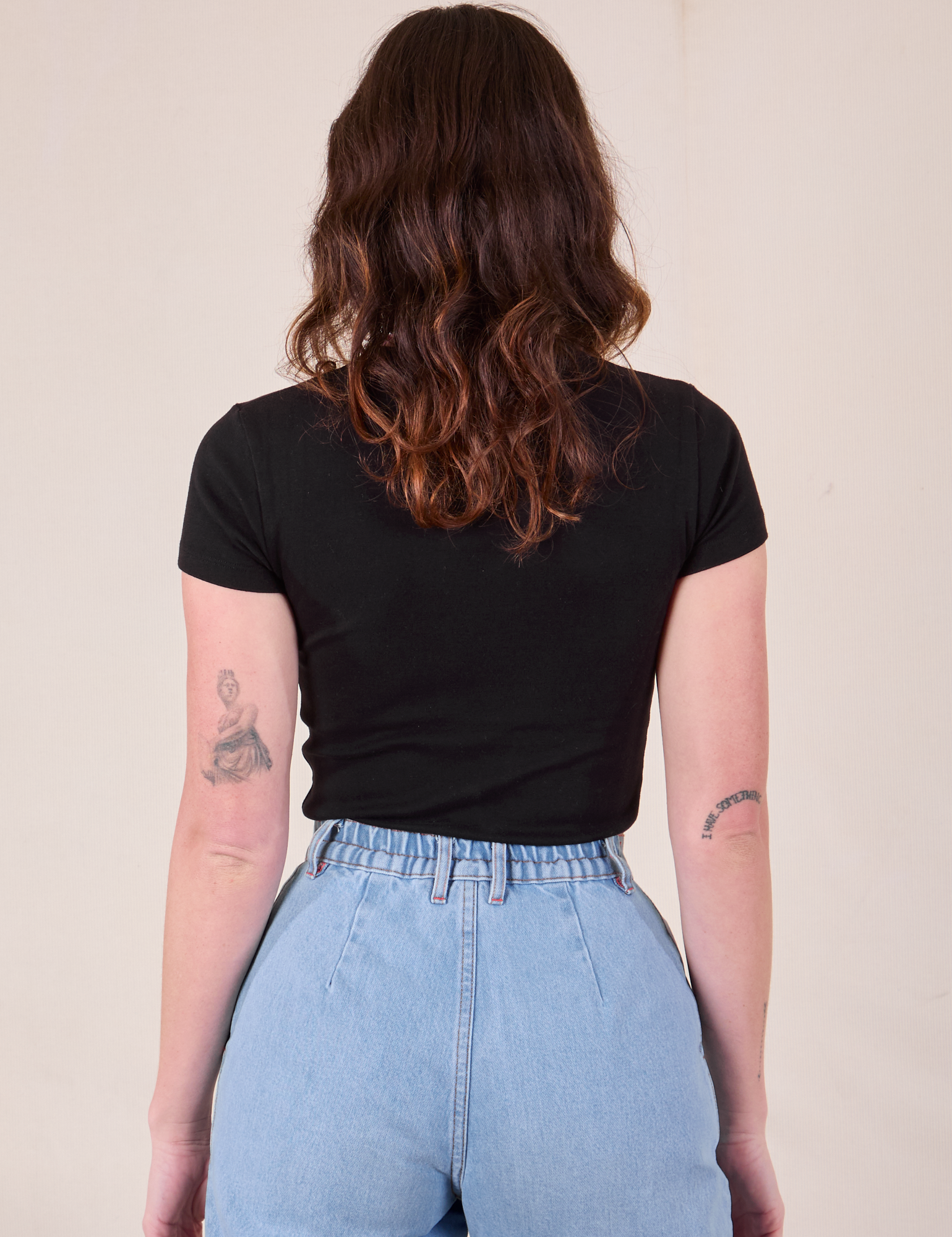 Baby Tee in Vintage Basic Black back view on Alex