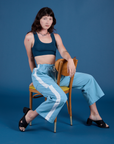 Painted Drop Pocket Cargo Pants in Baby Blue and lagoon Mini Tank worn by Alex