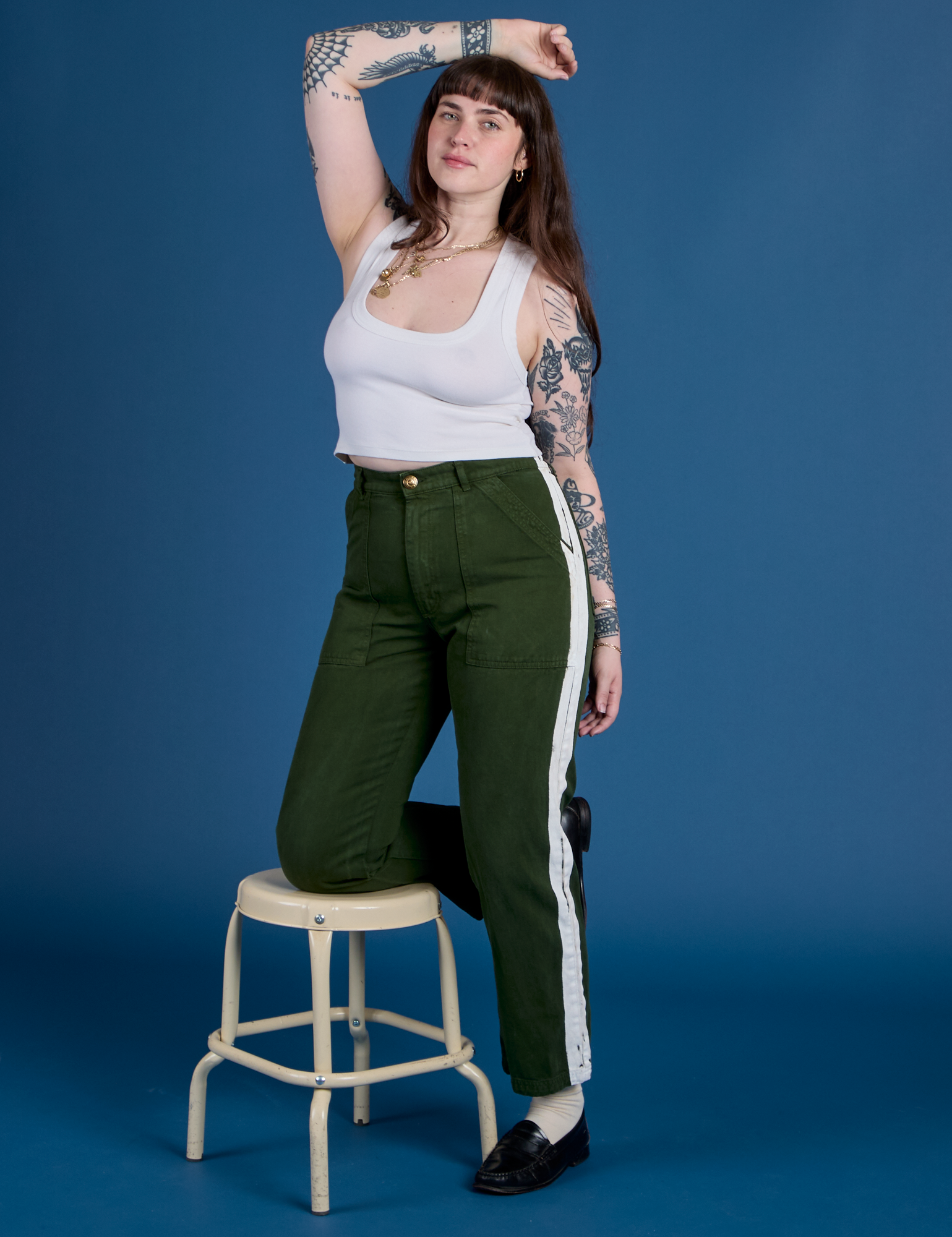 Painted Work Pants in Evergreen and vintage tee white Cropped Tank worn by Sydney