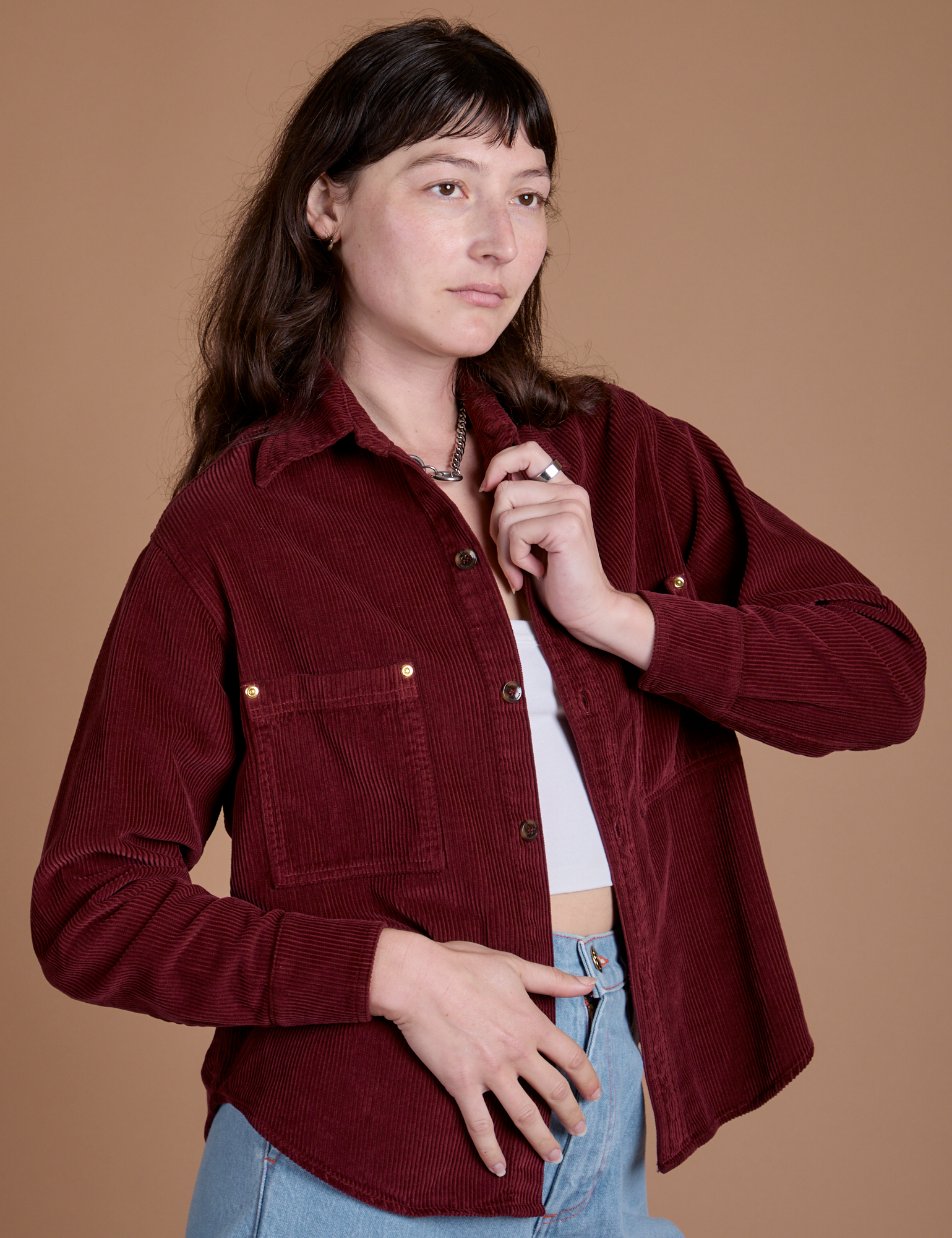 Angled front view of Cropped Corduroy Overshirt in Red Wine on Alex