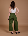 Drop Pocket Cargo Pants in Evergreen back view on Alex