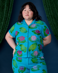 Ashley is wearing a buttoned up Paintstamped Pantry Button-Up in Lilypad