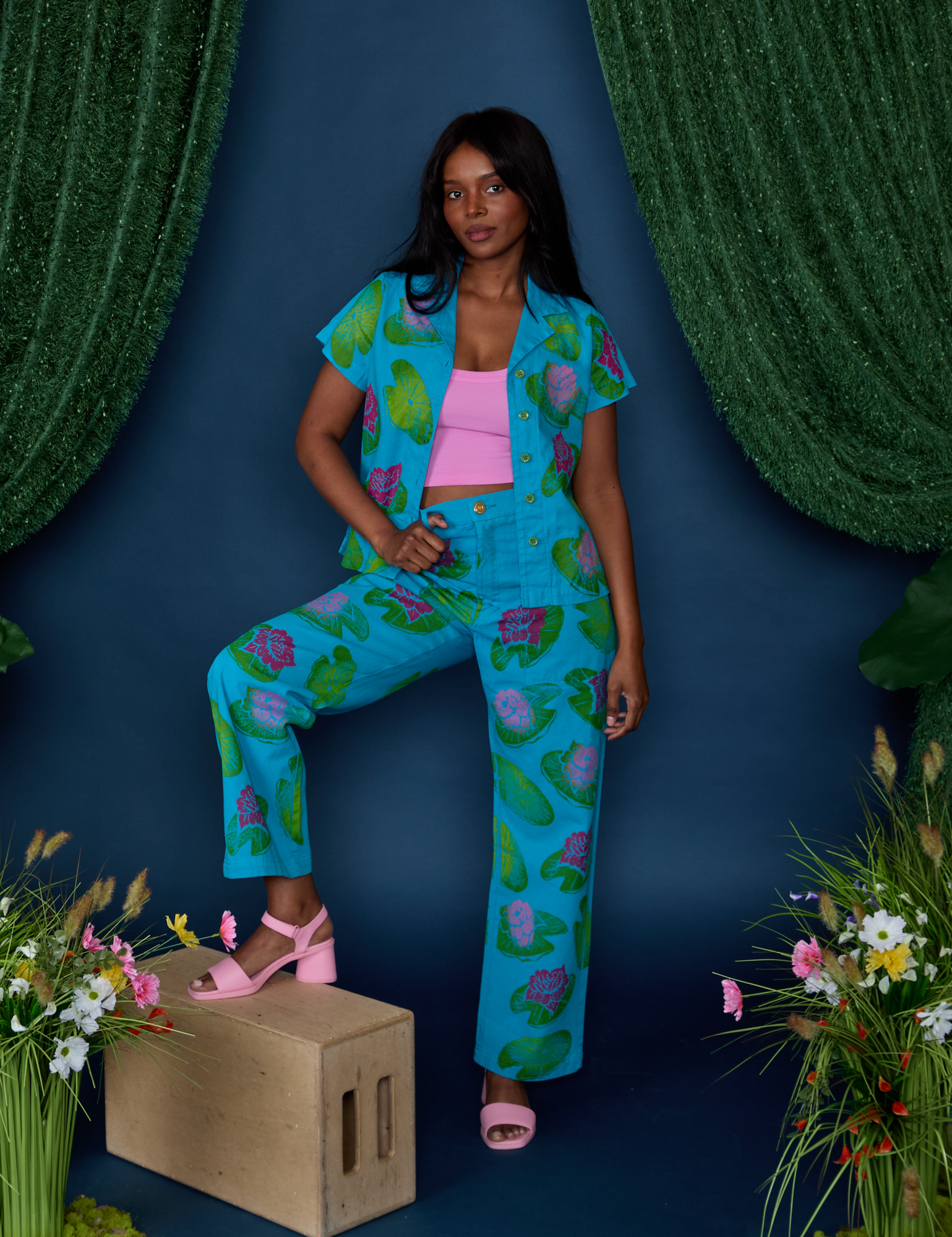 Kandia is wearing Paintstamped Work Pants in Lilypad and matching Pantry Button-Up