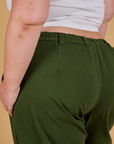 Baggy Mid-Rise Trousers in Evergreen back close on Juliet