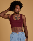Jerrod is 6’3” and wearing S Mini Tank in Red Wine