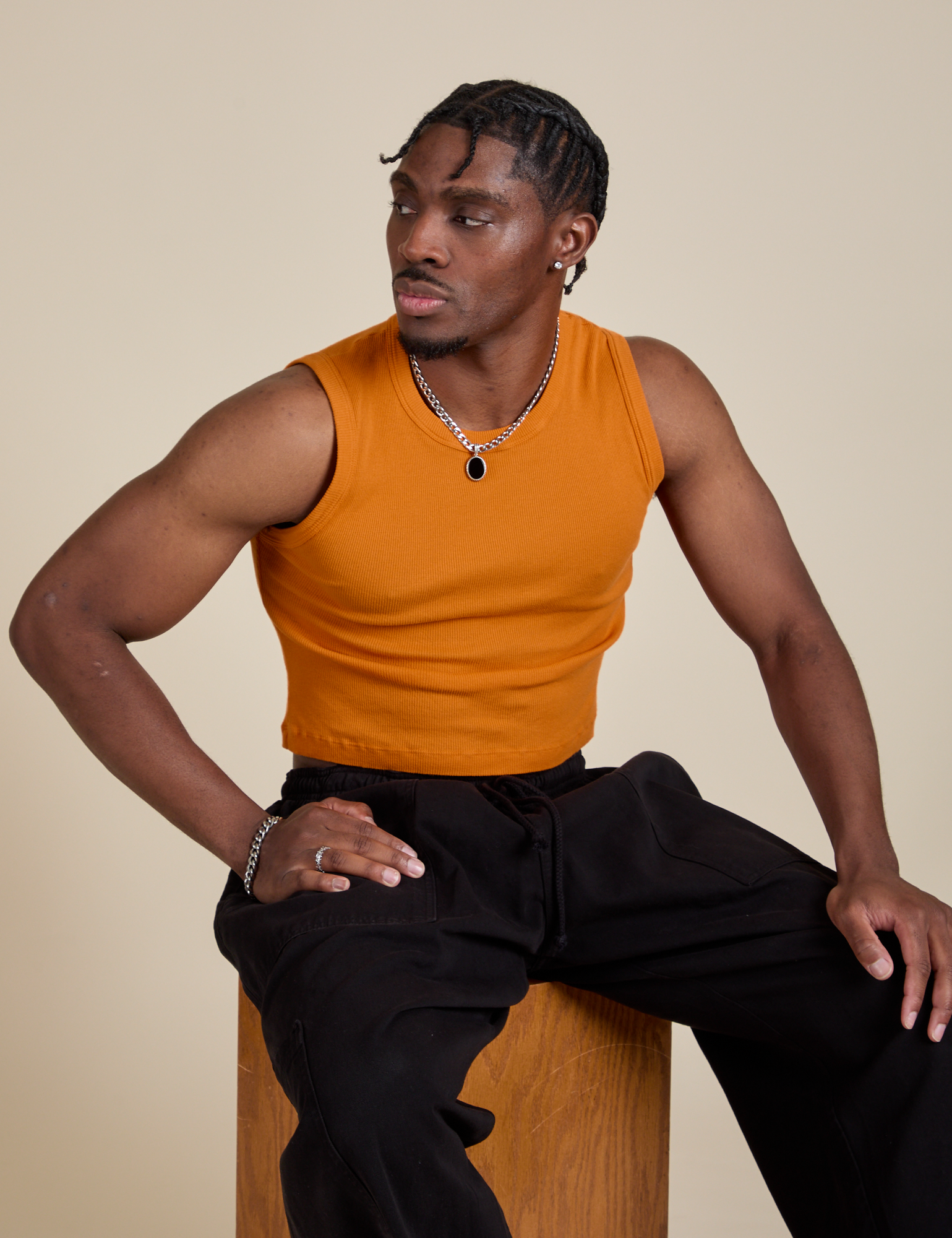 Muscle Tee in Creamsicle Orange worn by Isaac