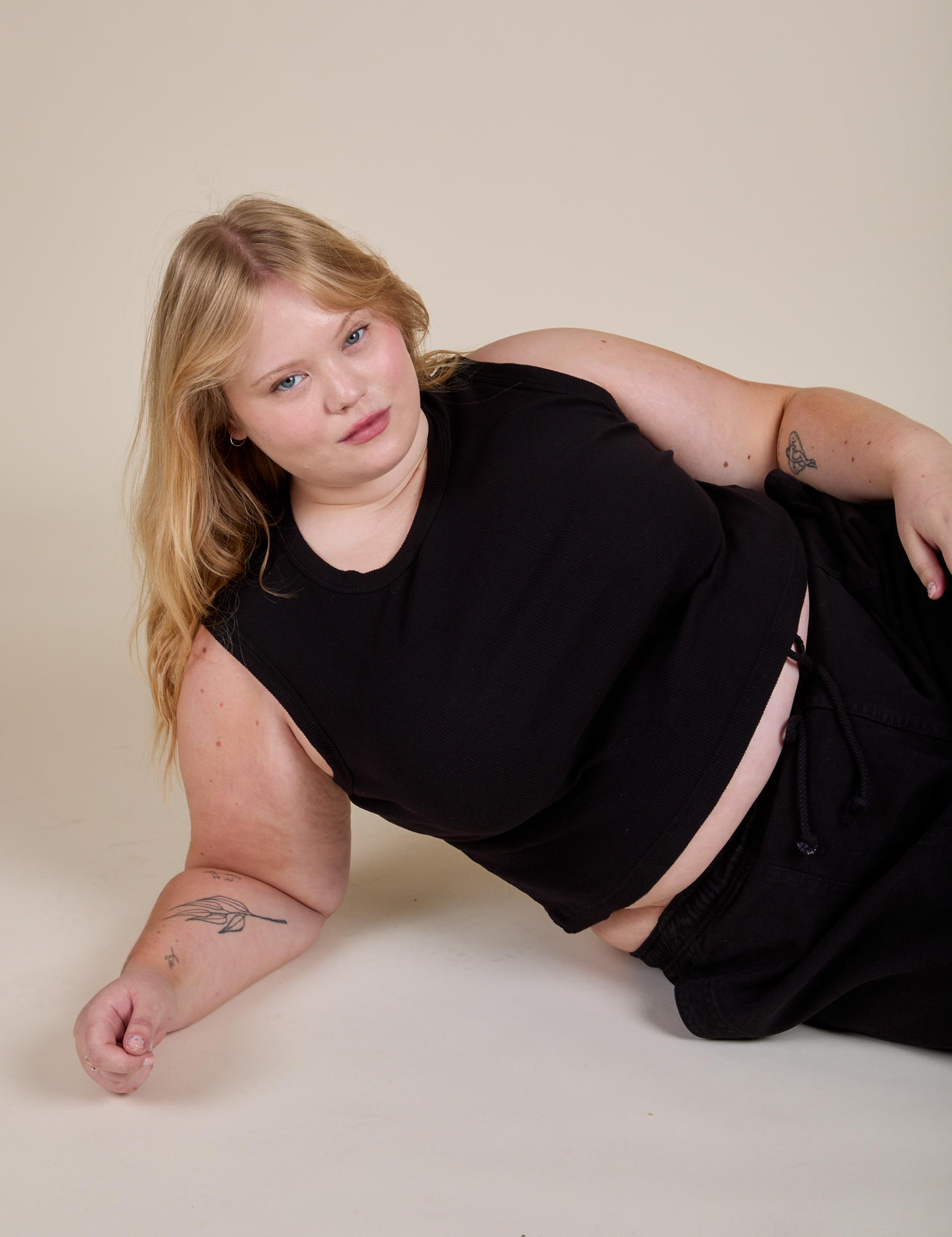 Juliet is wearing Muscle Tee in Basic Black