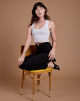 Organic Work Pants in Basic Black and Cropped Tank in Vintage Tee White on Alex