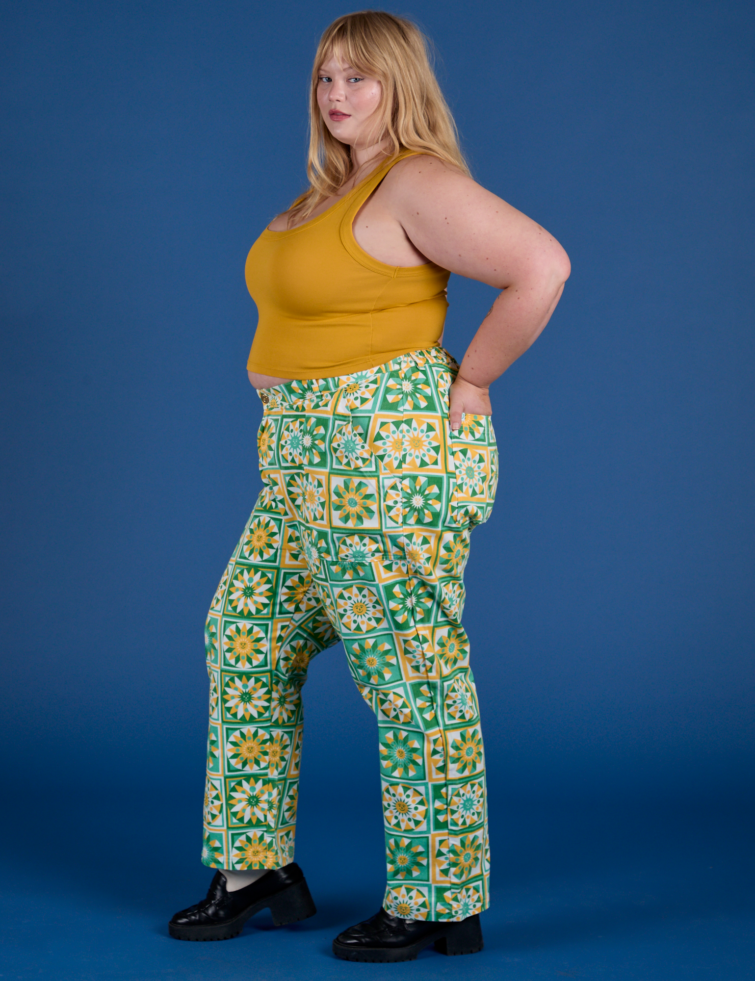 Side view of  Work Pants in Spring Quilt Print and mustard yellow Cropped Tank