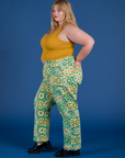 Side view of  Work Pants in Spring Quilt Print and mustard yellow Cropped Tank