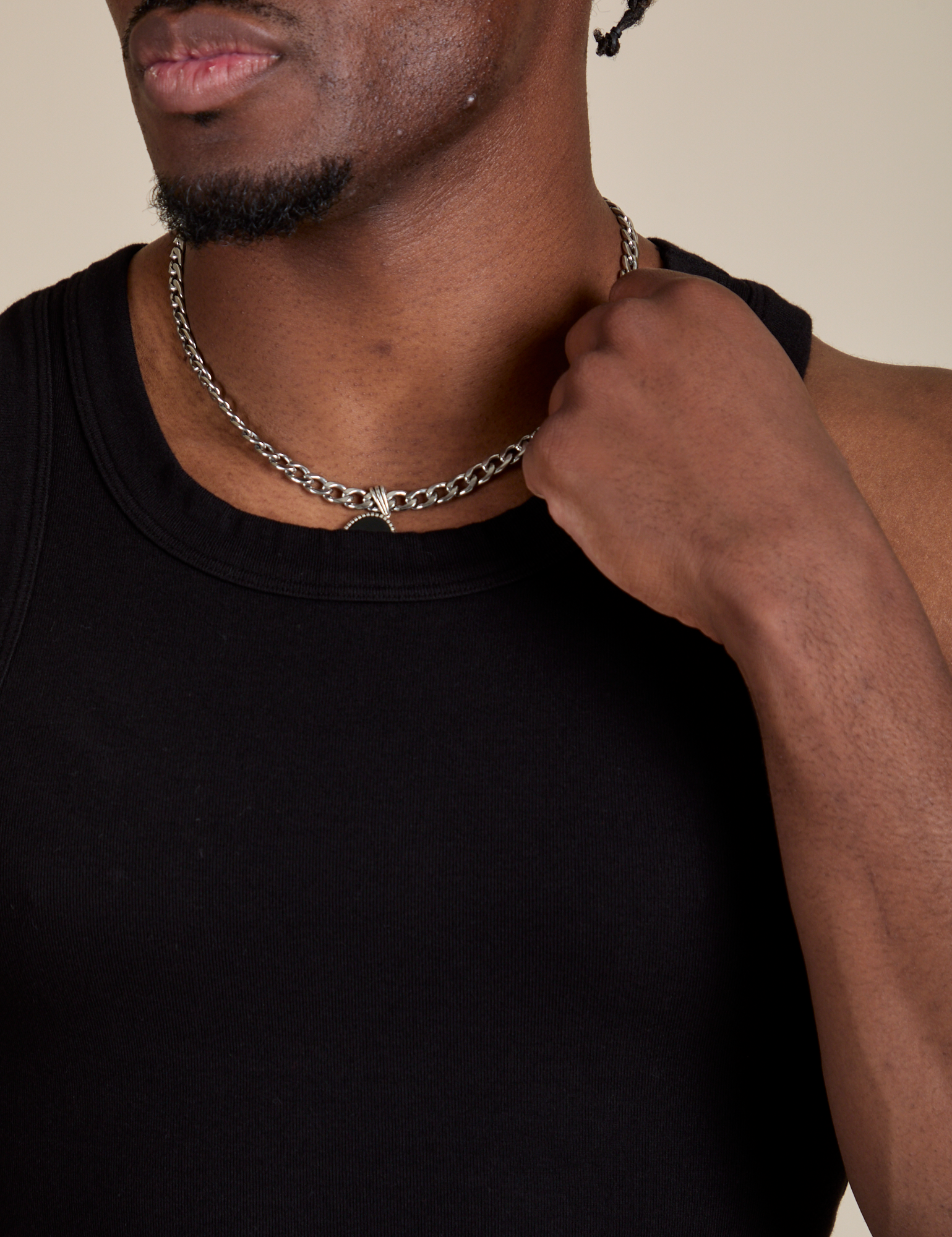 Racerback Tank in Black close up on Isaac