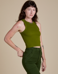 Racerback Tank in Summer Olive angled front view on Alex