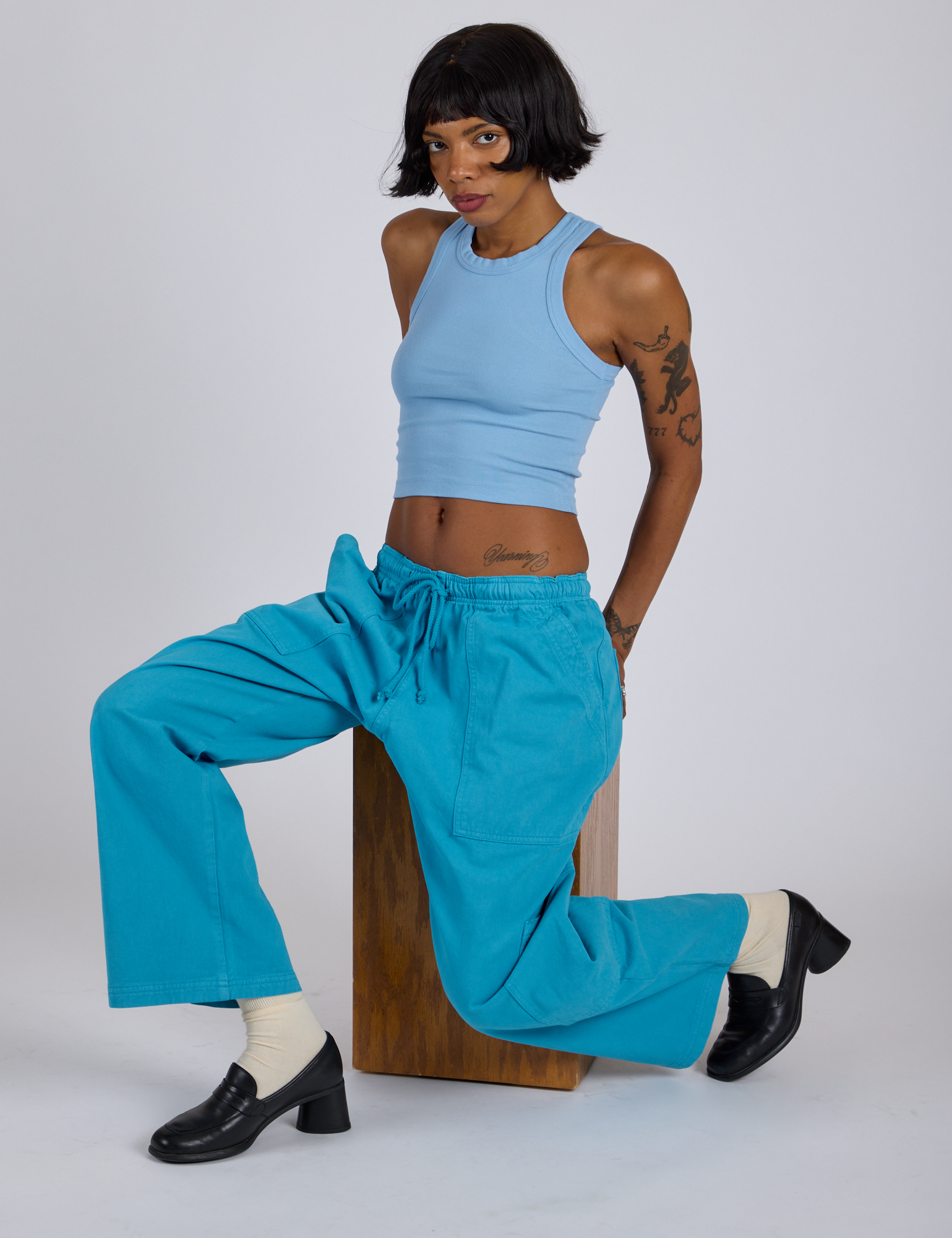 Drop Pocket Cargo Pants in Hawaiian Blue and baby blue Racerback Tank worn by Kira