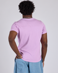 Jr. Varsity Tee in Lilac Purple back view on Isaac