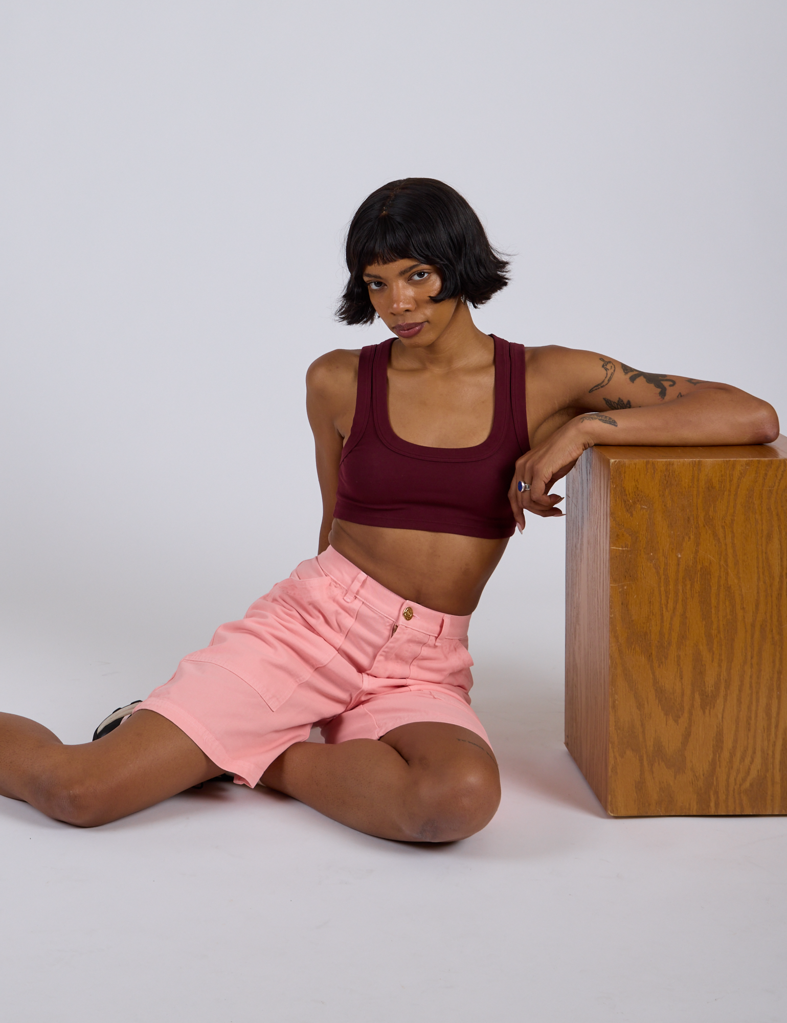Longline Work Shorts in Baby Pink and Mini Tank in Red Wine on Kira